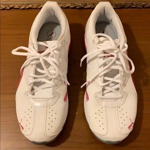 White with pink Pumas